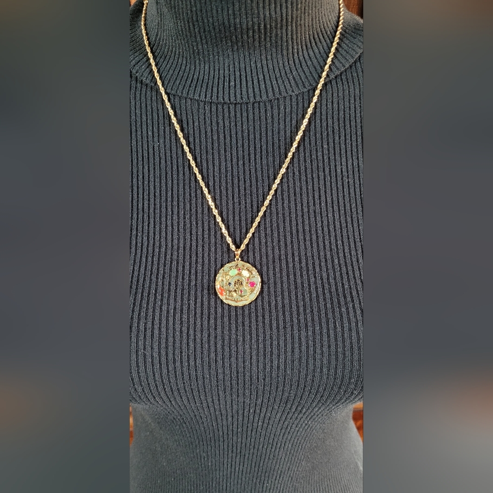 Asian influenced Jade pendent and 20-inch 14 kt gold chain